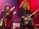 Brian Wheat (L) and Frank Hannon of Tesla performs onstage at the Paramount on October 25^ 2018 in Huntington^ New York.