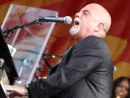 Billy Joel performs on state at the 2013 New Orleans Jazz and Heritage Festival. New Orleans^ Louisiana - April 27^ 2013