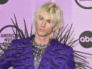 Machine Gun Kelly (MGK) at the 2022 American Music Awards at the Microsoft Theatre. LOS ANGELES^ CA. November 20^ 2022