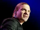 Brent Smith of Shinedown against a black and blue background at Rockstar Uproar Festival on September 25 2012 in Nampa^ Idaho.