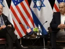 US President Joe Biden (L) listens to Israel's Prime Minister Benjamin Netanyahu as he joins a meeting of the Israeli war cabinet in Tel Aviv on October 18^ 2023