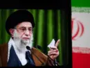 This image captures Iranian Supreme Leader Ali Khamenei giving a speech^ with the Iranian flag prominently displayed.