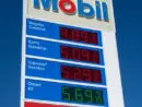 Mobil gas station sign showing high price of California Gasoline with bright blue sky Lone Pine^ CA^ USA - February 9th^ 2023