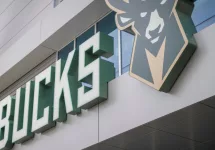 Milwakee Bucks text and logo at NBA Basketball Fiserv Forum arena