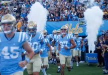 UCLA players run out of the tunnel before an NCAA college football game between the UCLA and the Colorado^ Oct. 28^ 2023^ in Pasadena^ Calif.