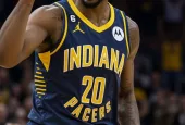 professional male nba basketball indiana pacers player^ screaming^ pointing finger up
