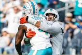 Miami Dolphins cornerbacks Kader Kohou (4) celebrates with Jalen Ramsey (5) after an interception against the Los Angeles Chargers during an NFL football game^ Sept. 10^ 2023^ in Inglewood^ Calif.