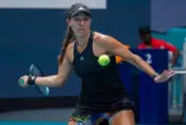 Professional tennis player Jessica Pegula of USA in action during Miami Open 2022 quarter-final match at the Hard Rock Stadium in Miami Gardens^ Florida MIAMI GARDENS^ FLORIDA - MARCH 30^ 2022