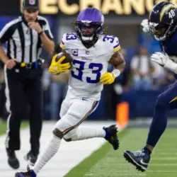 Minnesota Vikings running back Aaron Jones in runs against the Los Angeles Chargers during an NFL football game Oct. 23^ 2025^ in Inglewood^ Calif.