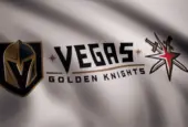 Waving flag with Vegas Golden Knights NHL hockey team logo. Close-up of waving flag with Vegas Golden Knights NHL hockey team logo^ seamless loop. Editorial footage