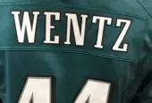 A fan wears the jersey of injured Eagles quarterback Carson Wentz in a mall. Minneapolis^ MN/USA- February 1^ 2018
