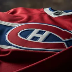 dramatic low angle Close up of Montreal Canadiens jersey^ crumpled^ dramatic lighting ((This content was generated by an Artificial Intelligence (AI) system.)