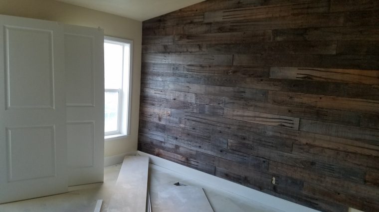 The-rustic-wood-wall-is-installed.jpg