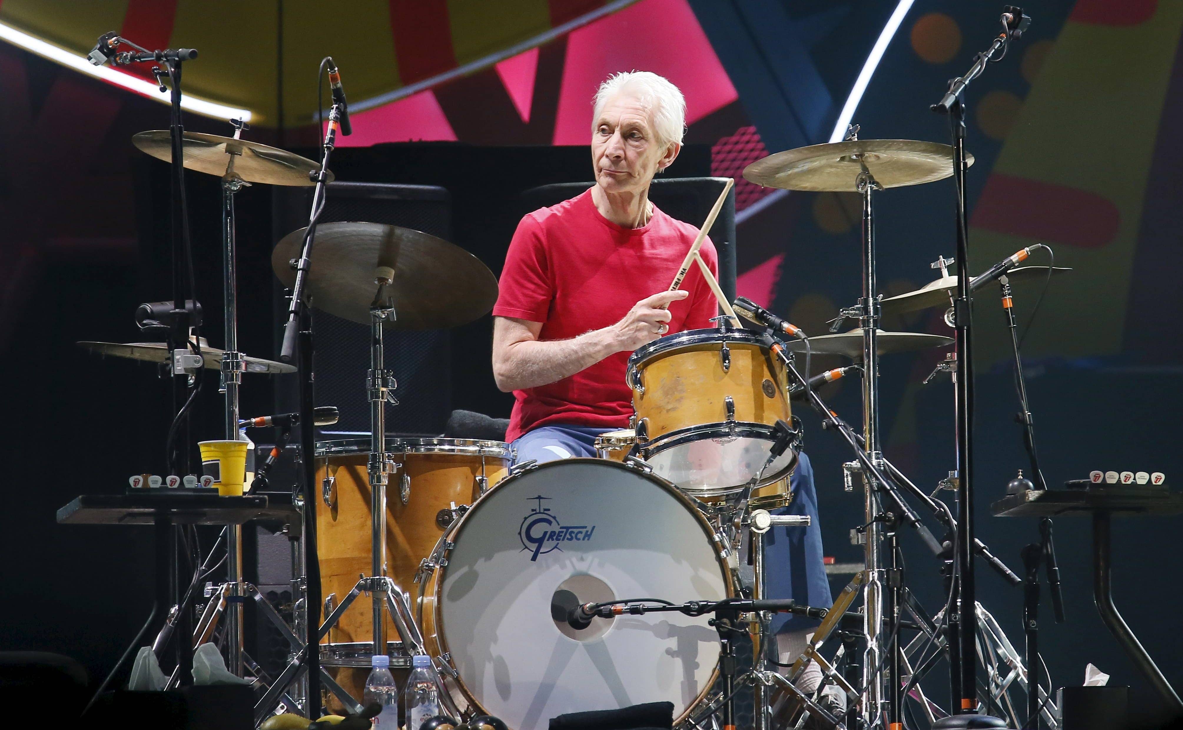 charlie-watts-of-british-veteran-rockers-the-rolling-stones-performs-with-his-band-members-mick-jagger-keith-richards-and-ronnie-wood-during-a-concert-on-their-latin-america-ole-tour-in-santiago