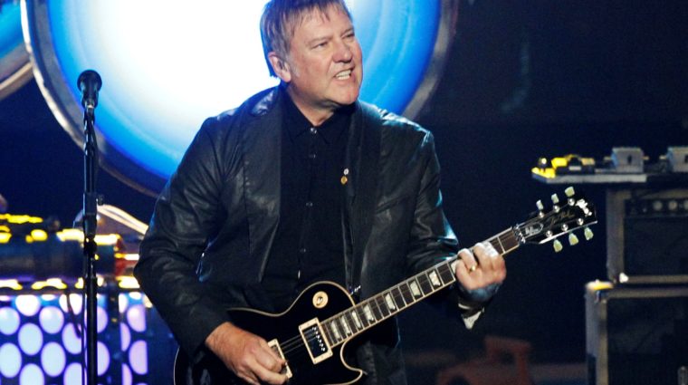 alex-lifeson-of-rush-performs-during-his-bands-induction-at-the-2013-rock-and-roll-hall-of-fame-induction-ceremony-in-los-angeles