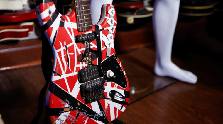 an-eddie-van-halen-fender-frankenstrat-guitar-that-he-played-sits-on-display-at-juliens-auctionsat-juliens-auction-at-hard-rock-cafe-in-new-york-city