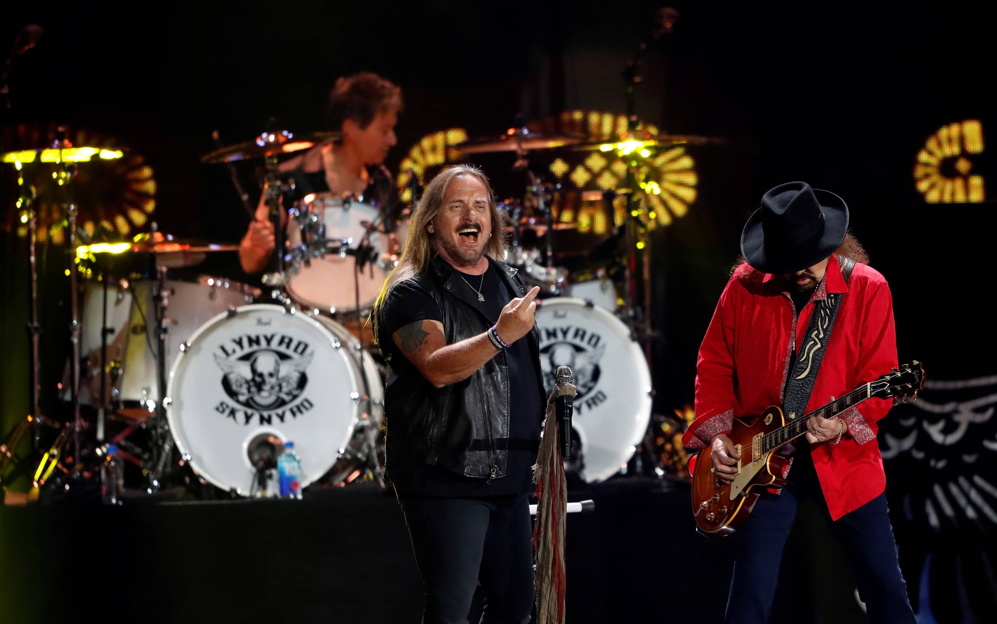lynyrd-skynyrd-lead-vocalist-johnny-van-zant-and-gary-rossington-perform-during-the-iheartradio-music-festival-at-t-mobile-arena-in-las-vegas