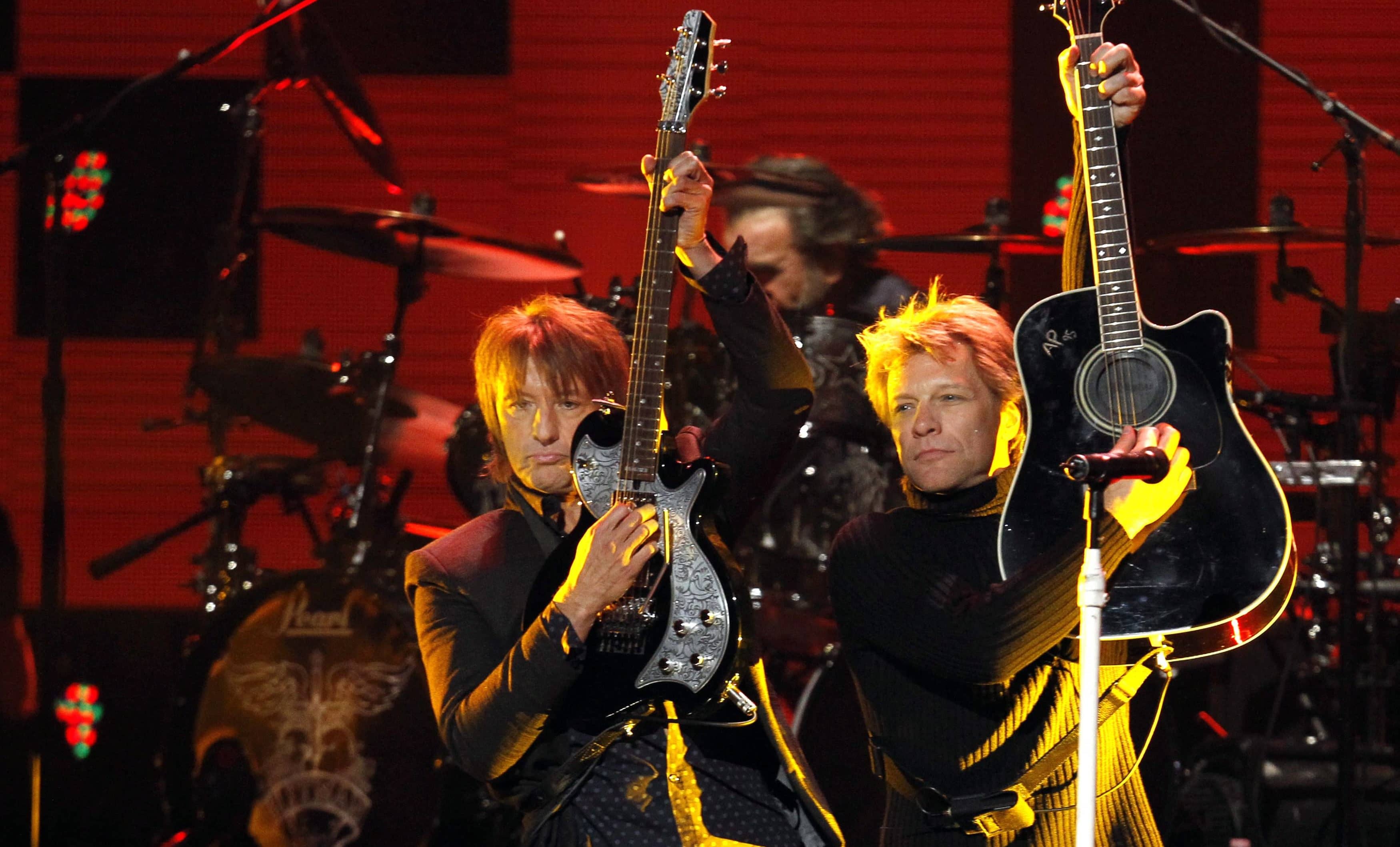 richie-sambora-and-jon-bon-jovi-perform-during-the-12-12-12-benefit-concert-for-victims-of-superstorm-sandy-at-madison-square-garden-in-new-york
