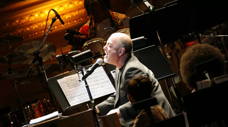 singer-joel-sings-in-aisles-of-carnegie-hall-during-rainforest-foundations-benefit-concert-in-new-york