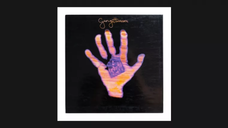 'Living in the Material World' is George Harrison's fourth solo album^ released in 1973. White background.