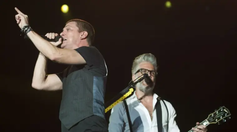 Matchbox 20 band vocalist Rob Thomas (L) performs during the Rock in Rio concert^ on September 20^ 2013 in Rio de Janeiro^ Brazil.