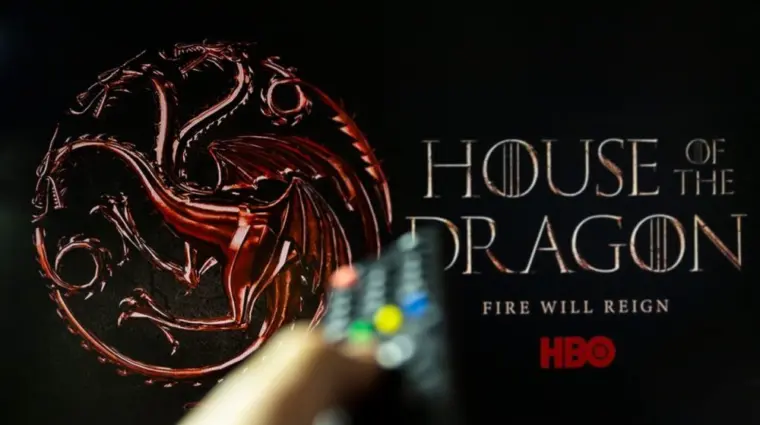 House of the Dragon HBO TV series on TV with remote control in hand. Focuse on the tv screen. Story takes place 300 years before events portrayed in Game of Thrones