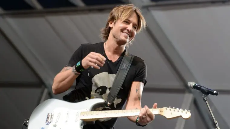 Keith Urban performs at the 2015 New Orleans Jazz and Heritage Festival. New Orleans^ LA - April 24^ 2015
