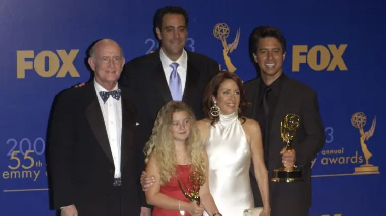 'Everybody Loves Raymond' stars PETER BOYLE (left)^ BRAD GARRETT^ MADYLIN SWEETEN^ PATRICIA HEATON & RAY ROMANO at the 55th Annual Emmy Awards in Los Angeles. Sept 21^ 2003