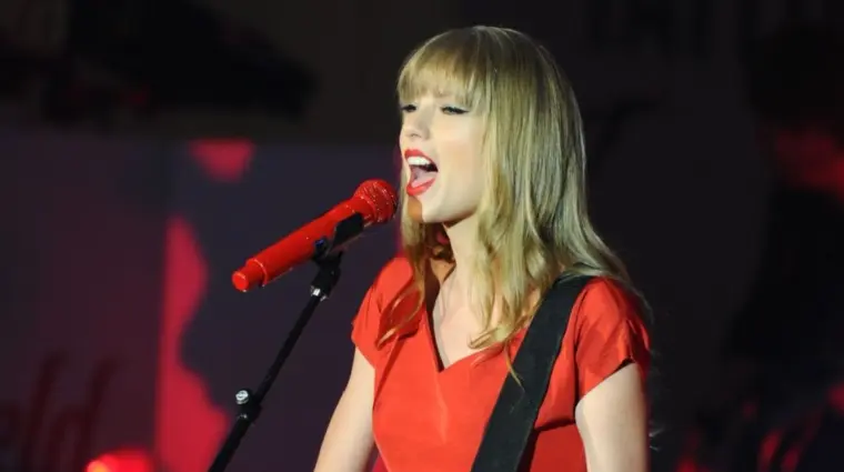 Taylor Swift performs and turns on the Christmas Lights at Westfield Shepherd's Bush^ London. 06/11/2012
