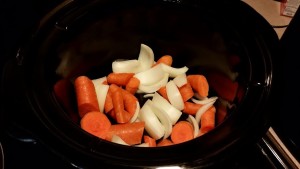 roast carrots oninons in the bottom