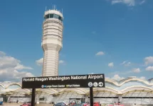 Control Tower^ National Airport seen from Metro Station platform. Ronald Reagan National Airport^ aka DCA^ is actually in Arlington^ three miles from DC. ARLINGTON^ VIRGINIA - OCT. 12^ 2017