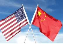 American and Chinese flags on cloudy sky. waving in the sky