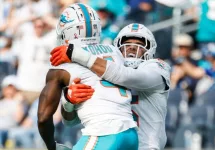 Miami Dolphins cornerbacks Kader Kohou (4) celebrates with Jalen Ramsey (5) after an interception against the Los Angeles Chargers during an NFL football game^ Sept. 10^ 2023^ in Inglewood^ Calif.