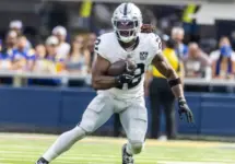 Las Vegas Raiders running back Alexander Mattison #22 runs the ball against the Los Angeles Rams in an NFL football game at SoFi Stadium^ Oct. 20^ 2024^ in Inglewood^ Calif.