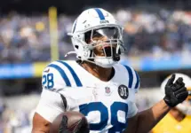 Indianapolis Colts running back Jonathan Taylor #28 runs for a touchdown against the Los Angeles Chargers during an NFL football game at SoFi Stadium^ Oct. 19^ 2025^ in Inglewood^ Calif.