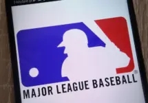 Major League Baseball logo displayed on a modern smartphone