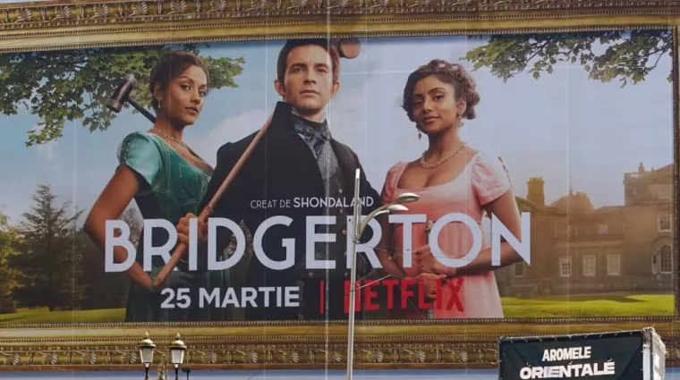 Banner advertising Bridgerton TV Series is displayed on the Unirea Shopping Center^ in downtown Bucharest.