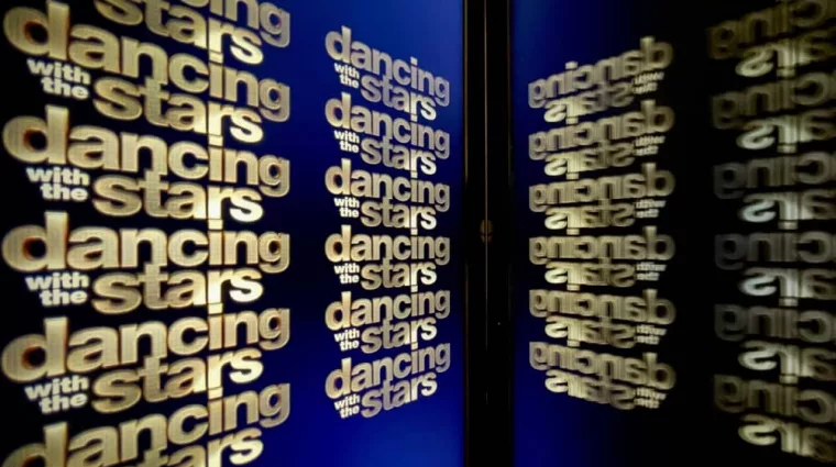 Official "Dancing With The Stars" logo multiplied and reflected by the tablet screen