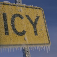 icy-road-sign-covered-with-frost-ice-winter-alaska