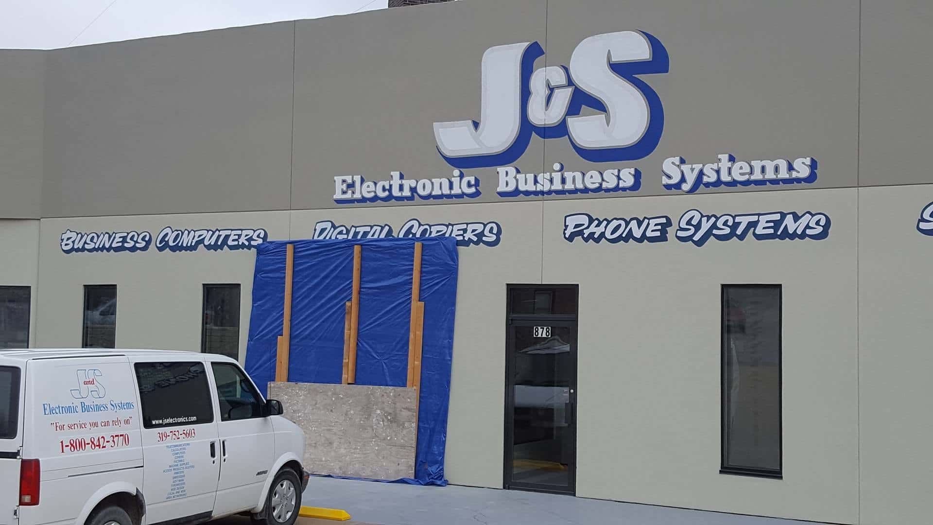 Damage to J&S Electronic Business Systems, the morning after a car crashed into the building.