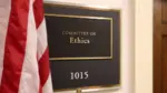A sign at the entrance to a House Ethics Committee hearing room in Washington^ DC on July 18^ 2017. The House of Representatives is the lower chamber of the US Congress.