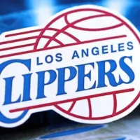 Los Angeles Clippers basketball team badge lies on basketball stadium background banner