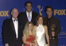 'Everybody Loves Raymond' stars PETER BOYLE (left)^ BRAD GARRETT^ MADYLIN SWEETEN^ PATRICIA HEATON & RAY ROMANO at the 55th Annual Emmy Awards in Los Angeles. Sept 21^ 2003