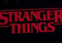 Iphone 11 pro with the Stranger Things logo on top of a computer keyboard. United States^ New York. Sunday^ September 29^ 2019.