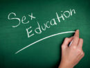woman-hand-writing-sex-education-on-green-blackboard