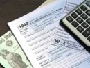 tax-forms-with-treasury-check-and-calculator