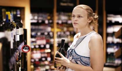womanbuyingbooze