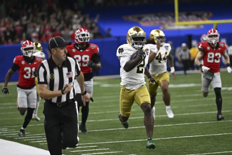 Friday Sports Notre Dame defeats to advance to CFP Semis 97