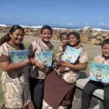 children-from-aunuu-show-their-new-books