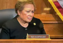 congresswoman-amata-speaking-in-a-december-congressional-hearing